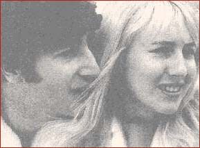 4: John and Cyn #3: John and Cynthia Lennon are captured in a relaxing moment during a boat ride in Miami, February 1964. John Lennon nuzzles his nose into his wife’s long blonde hair.