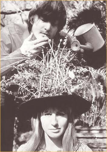 8: Lennon’s English Garden #8: John Lennon gets nutty making a joke about smoking the “weed” on his wife Cynthia’s hat in this photo session from 1965. He’s also “watering” the hat, as Cyn poses sedately on a bench in the Lennon’s English garden at Kenwood.