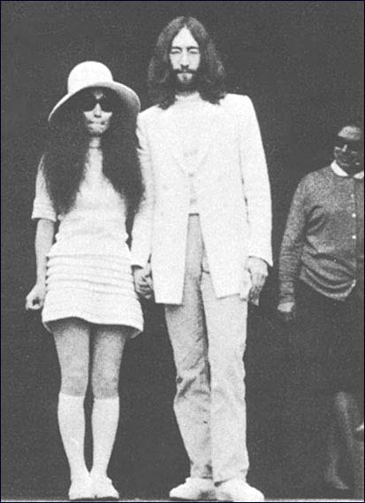 John and Yoko pose after the wedding