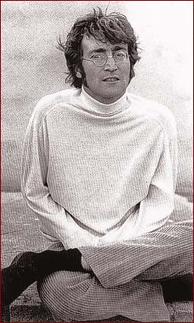 John Lennon takes a break in the chilly weather during the making of Magical Mystery Tour.