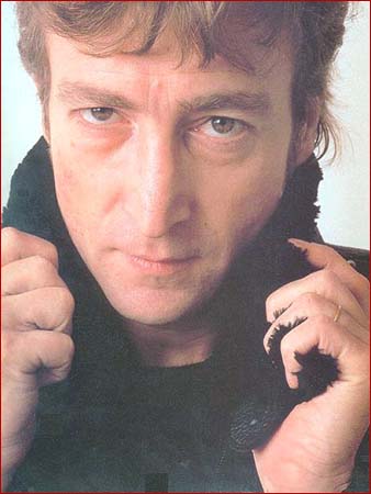 John Lennon shows his sense of humor in a photo session December 8, 1980.